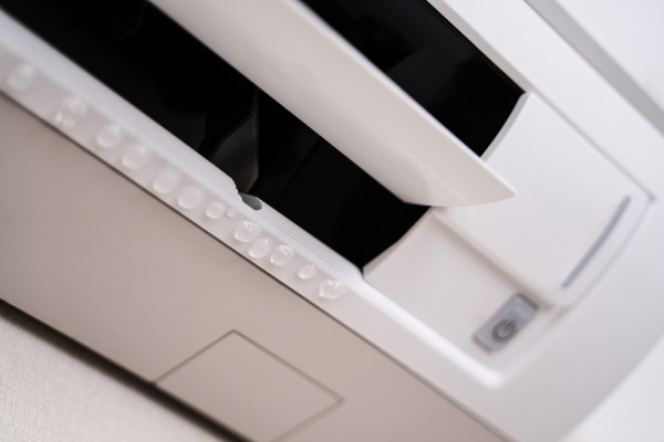 close up of water leaking from aircon